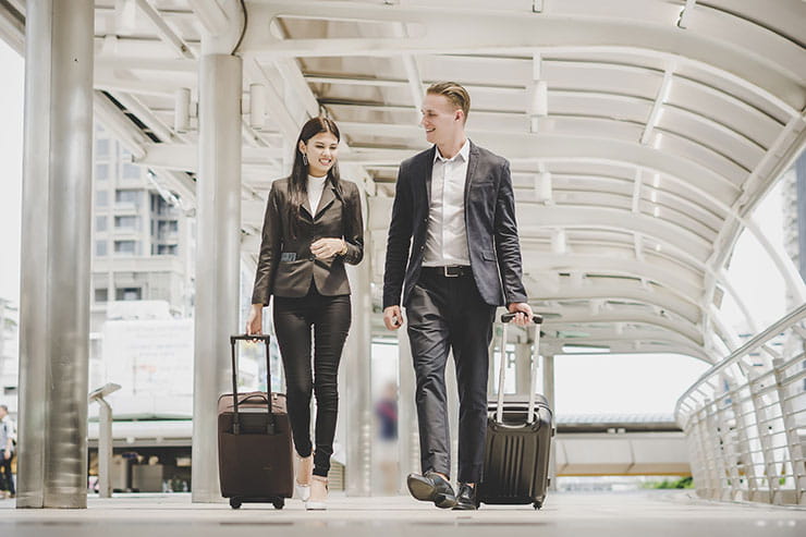 Businessman and woman are going on a business trip: How to get a job in Canada