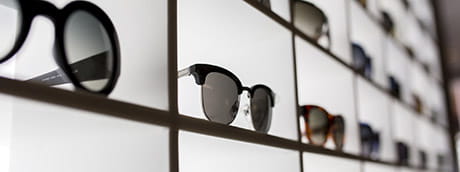 Sunglasses on display in
                a store